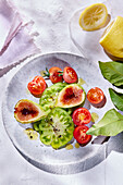 Marinda and cherry tomatoes with figs and Amalfi lemon dressing