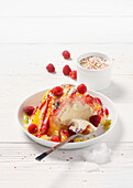 Vanilla Ice Cream with Mango Sauce, Raspberries and Sprinkles
