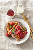 Coconut waffles with raspberry sauce