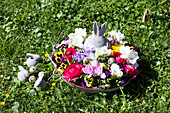 Flower bowl with Easter bunny on the lawn