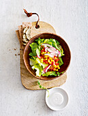 Salad with mango pepper salsa; bread with lentil cream