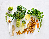 Ingredients for vegan fusilli with broccoli and Asian nettle pesto