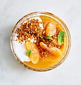 Vegan mandarin jelly with millet cinnamon crunch