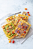 Colorful veggie pizzas with quark-oil dough
