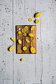 Mini lemons on a cutting board