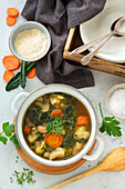 Vegetable soup with cabbage, cauliflower, carrots and beans