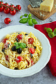 Pasta with ricotta, tomatoes and olives