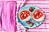 Yogurt with strawberry sauce and fresh strawberries