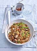 Barley risotto with green beans, mushrooms, and almonds
