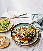 Baked cauliflower steaks with hazelnuts, ajo blanco and grapes