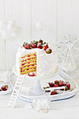 Strawberry and passionfruit mile high layer cake