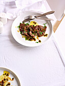 Veal with caper butter sauce