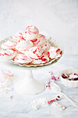 Rosewater and raspberry swirl meringues