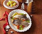 Boiled carp with vegetables and vinegar
