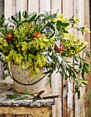 Bouquet with olive branches, silver acacia (Acacia dealbata) and silver bush (Protea)