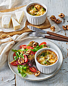 Broccoli and goat cheese soufflé with fresh salad