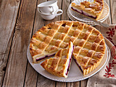 Lattice pie with redcurrant jam and curd cheese