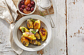 Pan fried potato gnocchi with poppy seeds and fruit compote