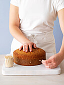 Marking the cake base to divide horizontally