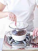 Melt the chocolate coating over a bain-marie