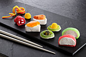 Colourful fruit jelly sweets in the shape of sushi