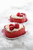 Heart-shaped cakes with mascarpone and raspberries