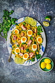 Kedgeree with salmon and soft-boiled curry eggs