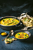 Yellow lentil curry with naan bread