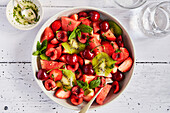 Red fruit and kiwi salad