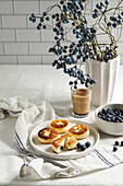 Syrniki (curd pancakes) with blueberries