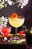 Royal Hawaiian cocktail garnished with roasted pineapple and maraschino cherries