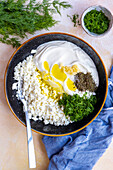 Crumbled feta cheese, Greek yogurt, garlic puree, chopped fresh dill, salt and dried mint
