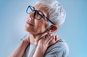 Senior woman with shoulder pain