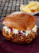 BBQ pulled pork and coleslaw on ciabatta roll