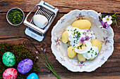Green sauce with potatoes and boiled egg for Easter