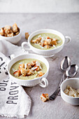 Asparagus soup with croutons and Parmesan cheese