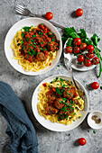 Vegan pasta with lentil balls and tomato sauce