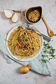 Pasta with braised miso onions with crunchy crumbs and thyme