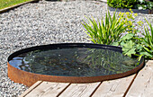 Water basin in the garden, minimalist design