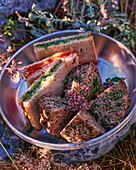Sandwiches with herb curd and caillettes (Provencal meatballs)