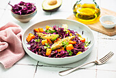 Red cabbage salad with pumpkin and avocado
