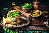 Vegetarian burger with peas and sprouts