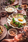 Waffles with lamb's lettuce and fried eggs