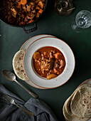 Hearty lamb stew with pita bread