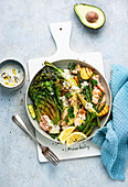 Potato and asparagus salad with salmon and roasted romaine lettuce