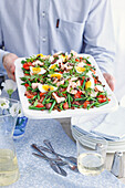 Puy lentil salad with salmon, green beans, egg, and olive dressing