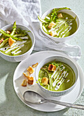 Green asparagus soup with croutons