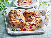 Yeast strudel with pudding and berries