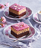 Two colour gingerbread cake bars with blackberry icing
