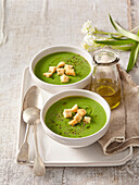 Creamy wild garlic soup with croutons